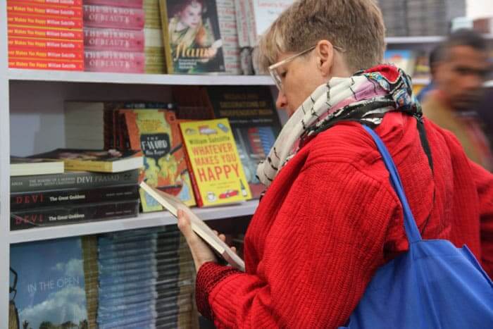 A foreign visitor looks at books in the bookstore at the 7th Jaipur Literary festival.